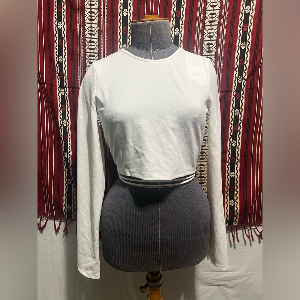 White crop top with back out and wrap around the waist straps